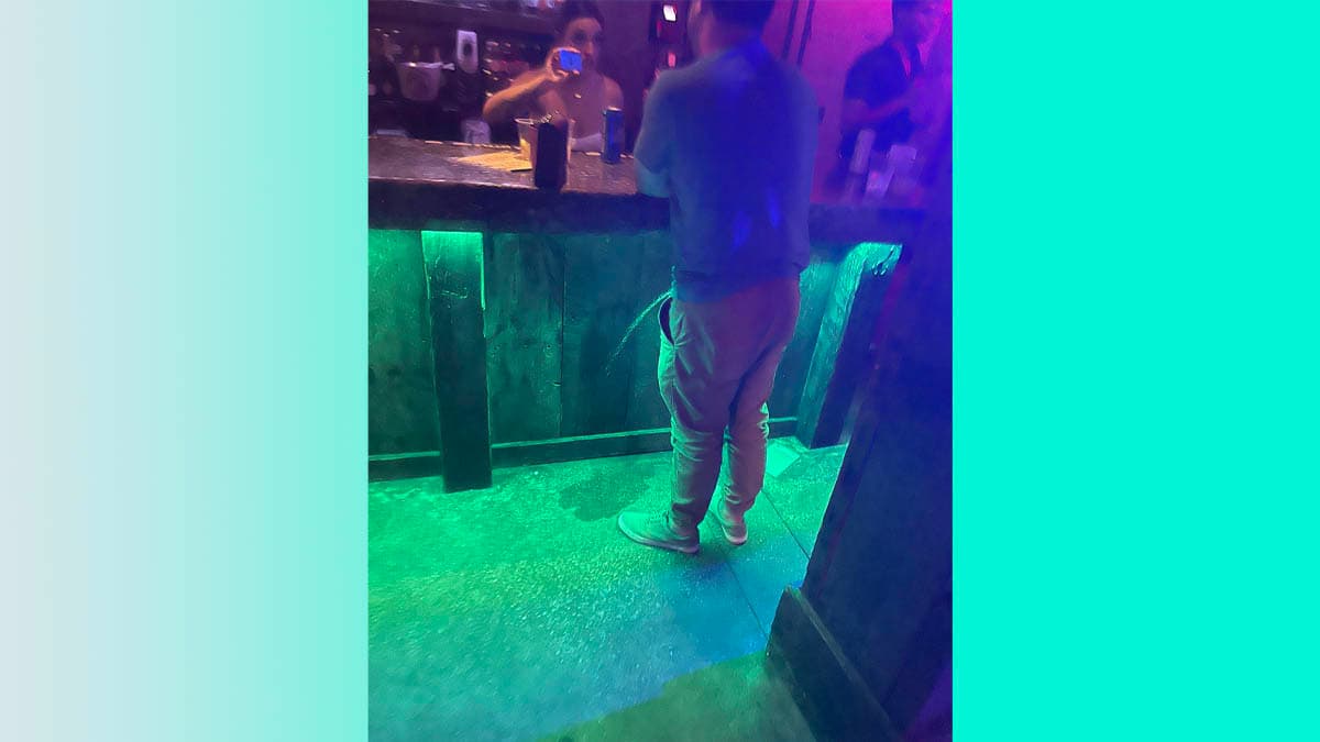 Drunk Guy Pissing at Bar meme template - Drunk Guy Pissing at Bar