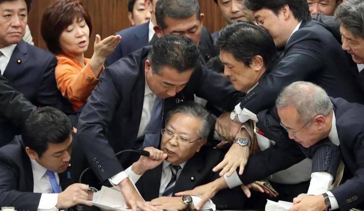 Japanese Parliament Trying To Stop Shinichi Yokoyama meme template - Japanese Parliament