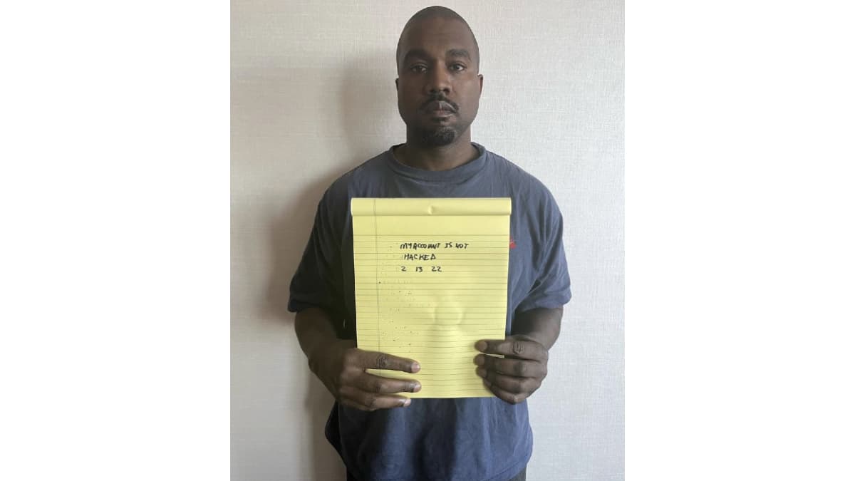 Kanye West Holding Notepad meme template - Kanye West Notepad