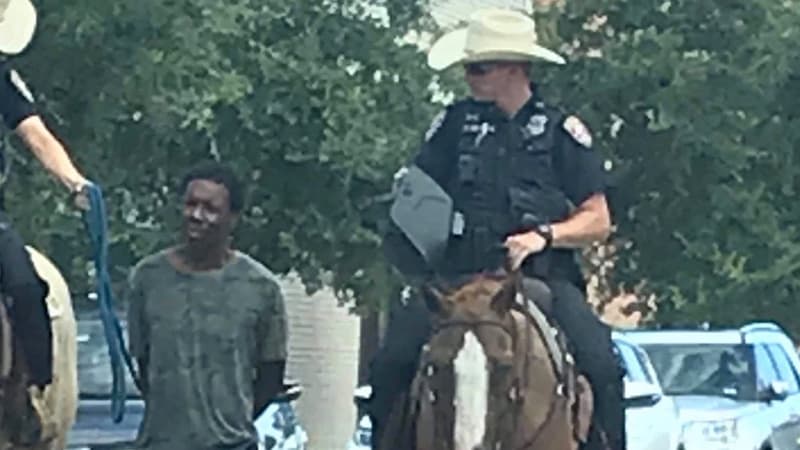 Mounted Police Officer Leading Black Man By a Rope meme template - Mounted Police Officer